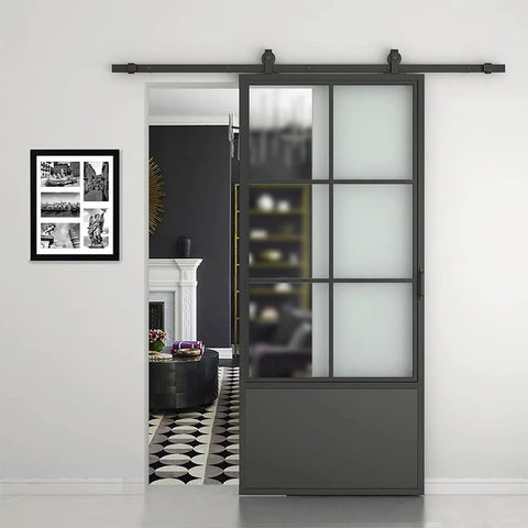 30 Inch By 84 Inch Frosted Glass Barn Door With Black Steel Frame And Three Quarter Lite Panels Ships Fully Preassembled With Sliding Hardware Kit And Door Handle For Interior Closets Bathrooms And Pantries Durable Powder Coated Finish installed in living room entryway