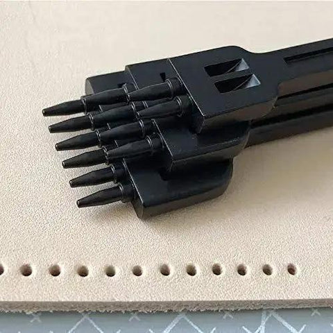 5mm Claw Tooth Leather Stitching Chisels Set With Round Hole Punching Tool for DIY Leather Craft on tan leather surface