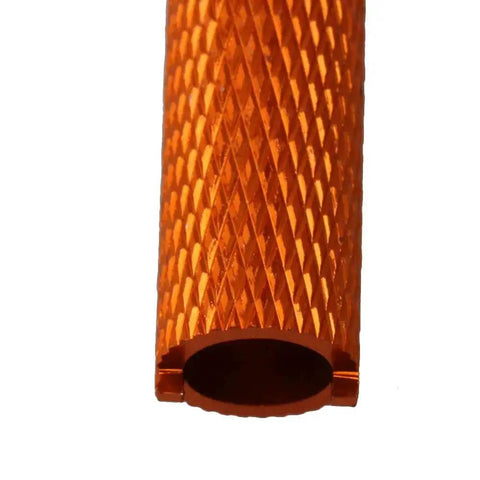 Close-up of orange CNC machined aluminum switch nut, textured finish, part of Orange Aluminum Alloy Remote Controller Switch Nuts With Tool.