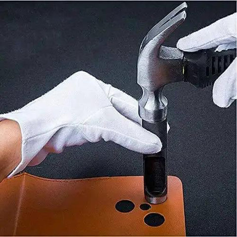 Using multi size round hole punch cutter set for leather belts, watch bands, and canvas, punching holes from 1mm to 18mm with ease.