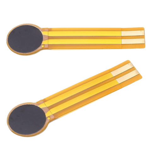 Two FLEXMAN thin-film pressure sensors on orange flexible film with circular black sensing pads