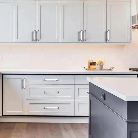 Modern kitchen with Polished Nickel Cabinet Pulls 10 Pack Five Sixteenths Inch Center Hole Cabinet Hardware on white cabinets.