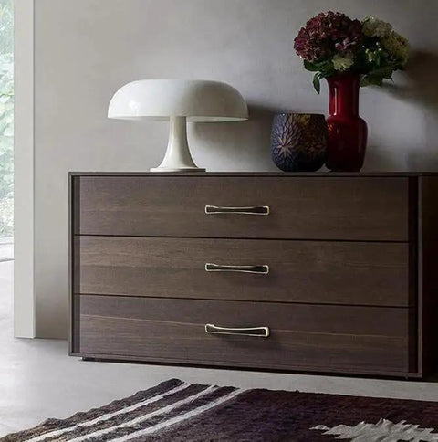 Dark wooden dresser with 2 Pack 5.0 Inch Hole Center Zinc Alloy Square Cabinet Handles In Black Gold Finish installed.