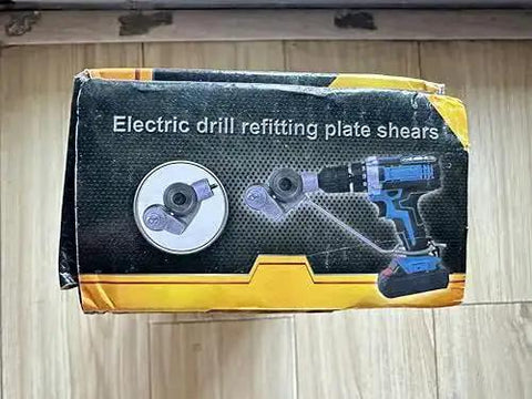 Box of Sheet Metal Cutter Drill Attachment with Serrated Wheel for Nibbler Style Cutting shown with adapter on power drill