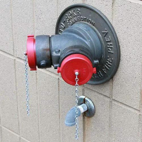 2 1/2 Inch NH NST Red Plastic FDC Plug With Rocker Lug Thermoplastic Not For Pressure Applications installed on hydrant