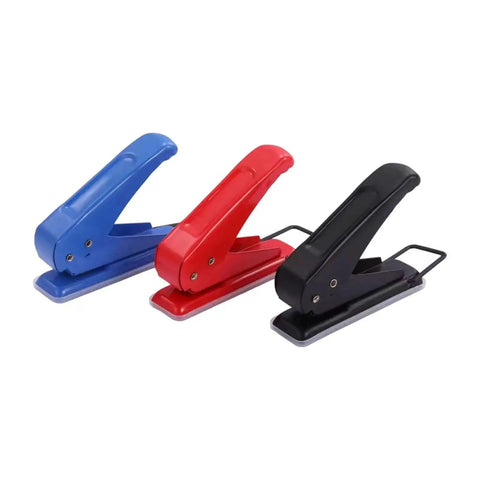 Three Go-To One Quarter Inch Single Hole Punchers in blue, red, and black with ergonomic grips, for school and office use.