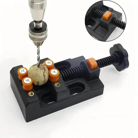 Mini Drill Press Vise Clamp For DIY Jewelry And Watch Repair holding a round object with drill bit, walnut core, manual drive grip visible.
