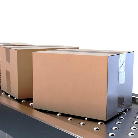Boxes on conveyor with Five Eighths Inch Ball Transfer Bearing Unit with Nylon Ball, flange mounted for smooth rotation.