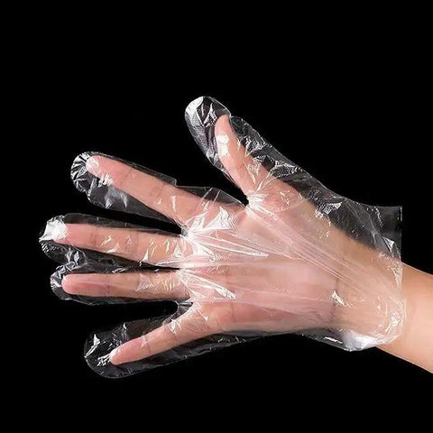 Clear Plastic Disposable Gloves For Food Prep And Service Bulk 6000 Pcs shown on hand for food handling use