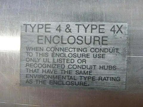 Label on Used Industrial Control Panel Enclosure N 379057, detailing Type 4X environmental rating for heavy duty metal cabinet.