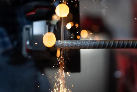 Aggressive Four And A Half Inch Cut Off Wheels Pack Of Five For Angle Grinders cutting metal with sparks visible