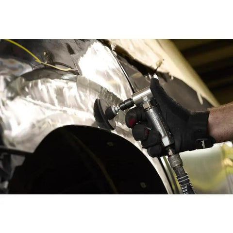 Person using Lightweight One Quarter Inch Right Angle Air Die Grinder With Twenty One Thousand RPM, Ball Bearing Construction on car panel