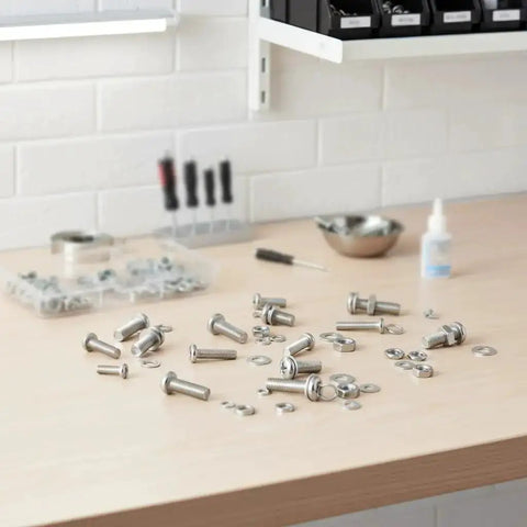 320 Piece Small Metric Machine Screws Set With Nuts And Washers, M2 To M5, Includes Lock And Flat Washers spread on a workbench