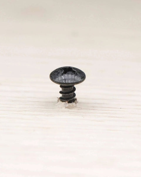 Installed view of a 100 Pieces No 8 Wood Screws Half Inch Truss Head Phillips Carbon Steel With Black Oxide Coating.