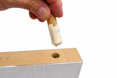 Inserting Pro Grade Fluted Birch Wood Dowel Pins 3/8 x 1-1/2 Inch into furniture board for joinery