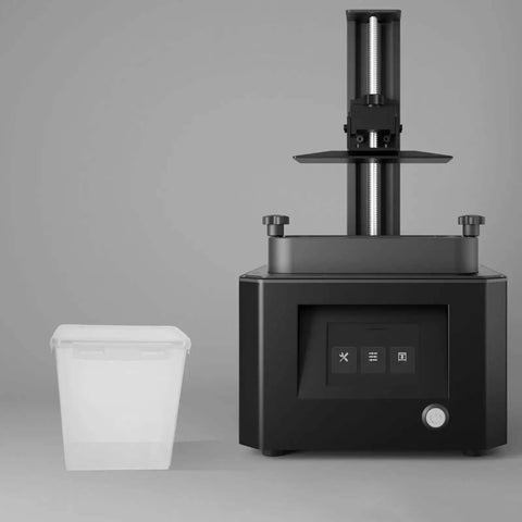 Filament Storage Box For 3D Printer With Drying System And Airtight Waterproof Seal 5.8L Capacity next to a 3D printer machine.