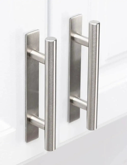 Two Pack Self Adhesive Drawer Handles Made From Corrosion Resistant Aluminum Alloy No Drilling Required Cabinet Pulls For Drawers Closets And More In Silver Finish Each Handle Measures About Five Point Nine Inches Long Five Point Nine Inches Wide And One installed on white cabinet doors