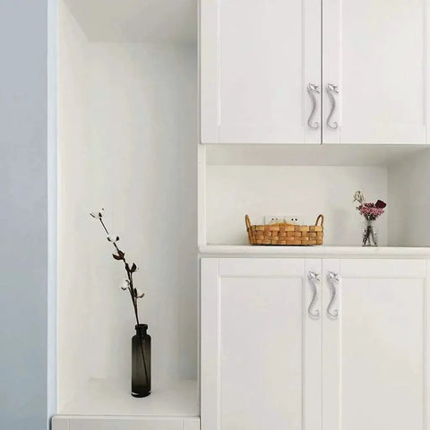 White cabinets with seahorse shaped drawer pulls ocean theme marine style cabinet hardware zinc alloy coastal metal decorative pulls for dresser chest cabinet cupboard and closet in durable silver finish installed.