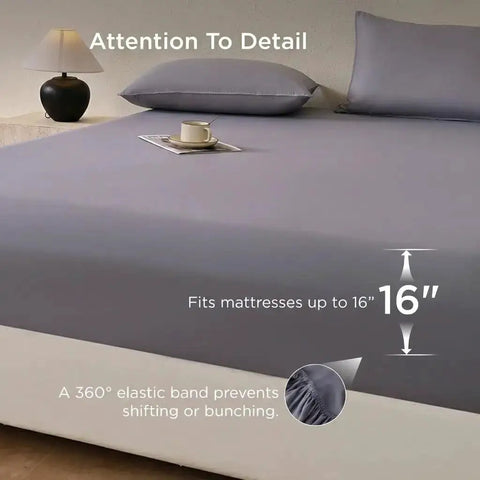 Grounding Fitted Sheets With 25 Percent Silver Infused Fiber And Cotton on bed, fits mattresses up to 16 inches, shown with lamp and cup