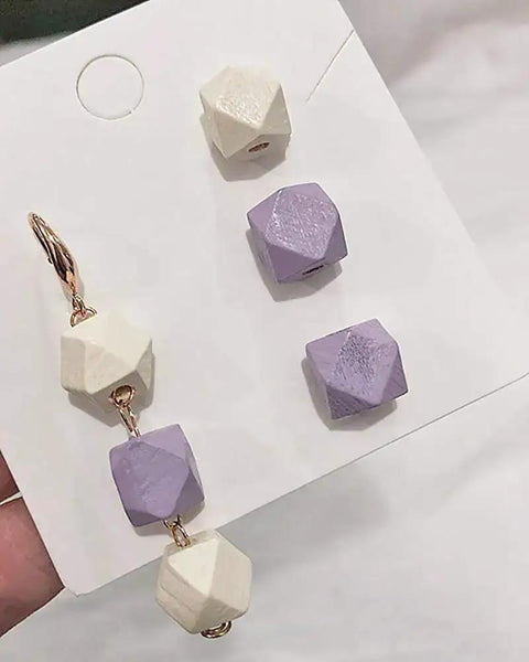 Unpainted Faceted Geometric Wood Beads 16mm With 3.5mm Holes Natural Color For DIY Jewelry Making 100 Pieces Dope For Necklaces Keychains And Crafts Assortment, featuring a mix of purple and natural wood beads.
