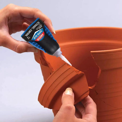 Applying Ultra Gel Control Clear Super Glue 0.14 Fl Oz Bottle 1 Pack to repair a broken terracotta pot