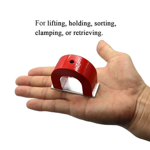 Beefy Red Alnico Horseshoe Magnet Workhorse With 40 Lb Pull Capacity in hand, showing size and metal construction.