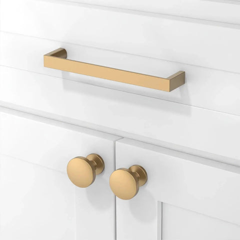 Champagne Bronze Cabinet Pulls 5 Inch 128mm Solid Zinc Alloy Handles for Kitchen Cabinets and Drawers installed on white cabinet