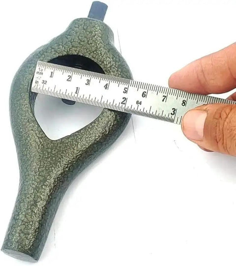 Close-up of Cast Iron Lathe Dog Straight Style Hand Workholding Tool For Turning Jobs, Heavy Duty Accessory with ruler for size reference.