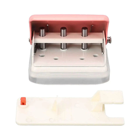 Pink 3 Hole Punch Handheld Paper Puncher With 5 Sheet Capacity And Metal Baked Finish showing underside view and tray