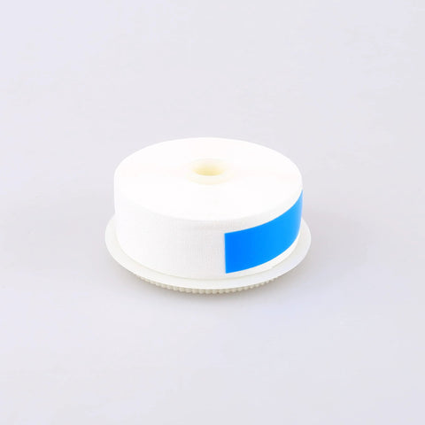 Fiber optic cleaner roll on spool, white fabric wrap with blue label, Amazon brand