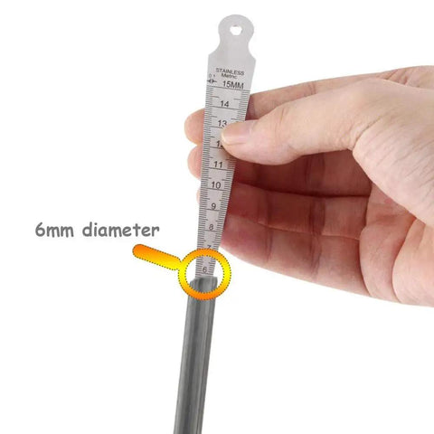 Stainless Steel Welding Taper Gauge Pro Grade, One To Fifteen Millimeter Range With Inch And Metric Scales in use showing 6mm diameter