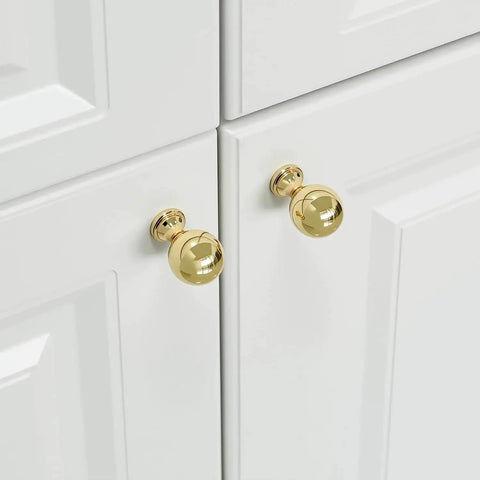 Installed 10 Pack Polished Gold Ball Cabinet Knobs Set 1 Inch Diameter Zinc Alloy Dresser Drawer Handles on white kitchen cabinets.