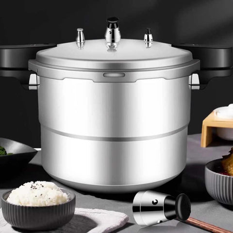 Pressure cooker with stainless steel body and universal relief jigger valve on lid; separate valve accessory beside pot.