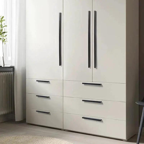 Black Tilted Aluminum Cabinet Handles 12 Pack 5 Inch 128mm Hole Centers Finger Pulls installed on white cabinet drawers.