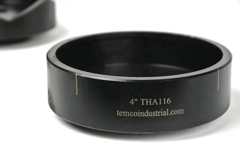Close-up of Beefy Four Inch Deep Draw Conduit Punch showing label "4'' THA116" and company website, part of hydraulic knockout driver set