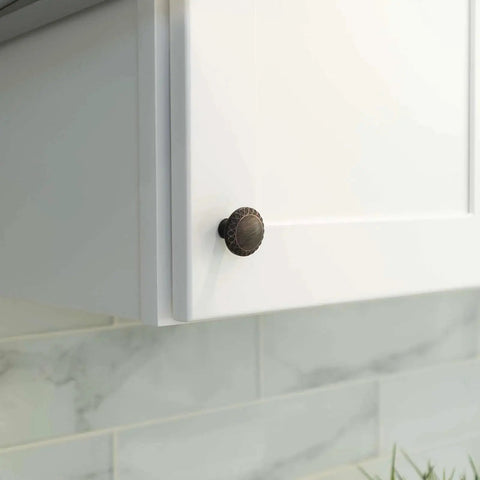 Ravenna Series Solid Traditional Kitchen Cabinet Pull Handle Knob One And One Quarter Inch Oil Rubbed Bronze 10 Packs installed on cabinet