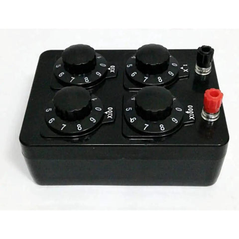 Top view: Acxico resistance box with four rotary dials and red/black terminals for electronics experiments.
