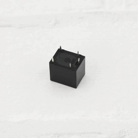 Single relay from Five Pack SRA-05VDC-CL Mini Power Relays With 5V DC Coils SPDT Contacts, compact PCB mount, front view.