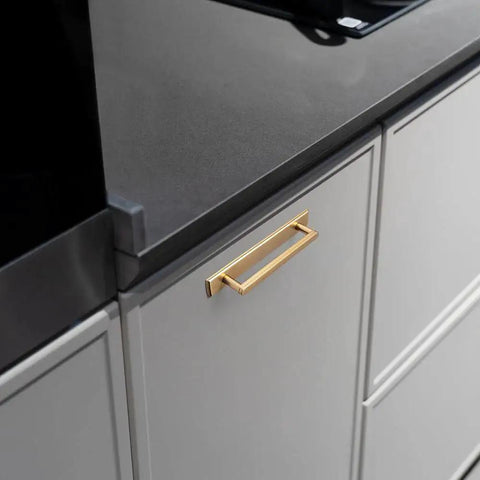 2 Pack 5 Inch Center To Center Champagne Bronze Cabinet Handles With Backplates installed on modern kitchen drawer