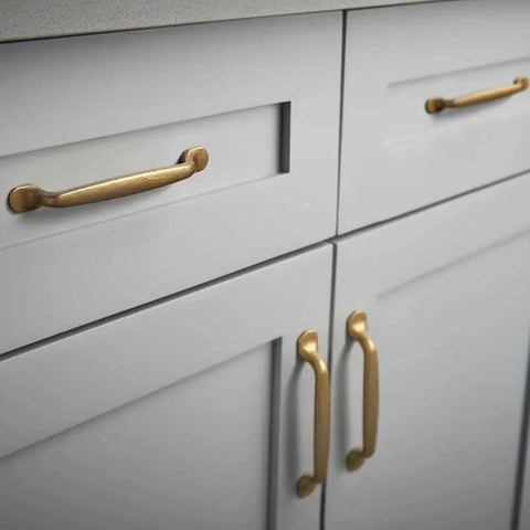 Set Of Six Traditional Five Inch Center To Center Antique Brass Cabinet Pulls With Curved Classic Design for vintage kitchen cabinets