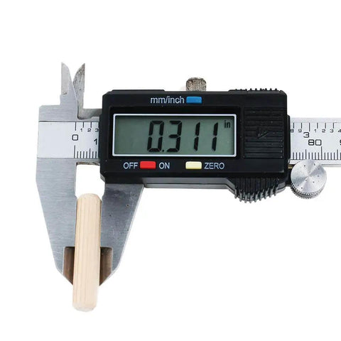Caliper measuring 5/16 in wood dowel for 100 Pack Five Sixteenths Inch Wood Dowel Pins One And One Half Inch Straight Grooved Hardwood