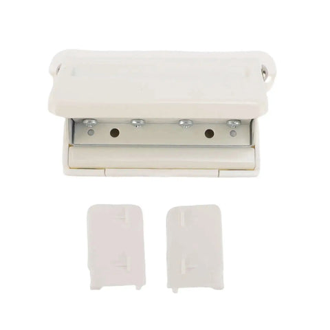 Top view of a mushroom shaped four hole paper punch with built in ruler and positioning posts metal handheld punch shown with removable parts.