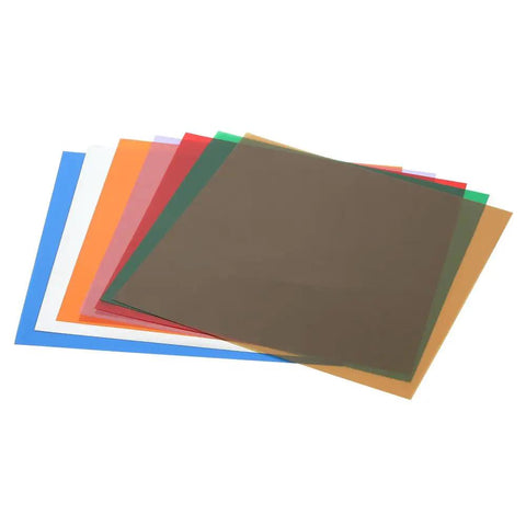 Polyester Shim Stock Assortment With 7 Sheets 5x5 Inches Colors Blue Green Purple Red Silver Thicknesses 0.0005 to 0.005 Inch Pro Grade Minimal Compression For Precise Machining stacked in various colors.