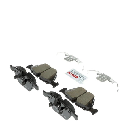 Bosch BC1260C QuietCast ceramic brake pad set for BMW front; includes four pads and mounting hardware