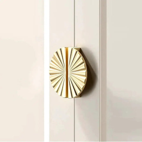 Semicircle Sunflower Cabinet Pulls In Brushed Gold Finish on kitchen cabinet