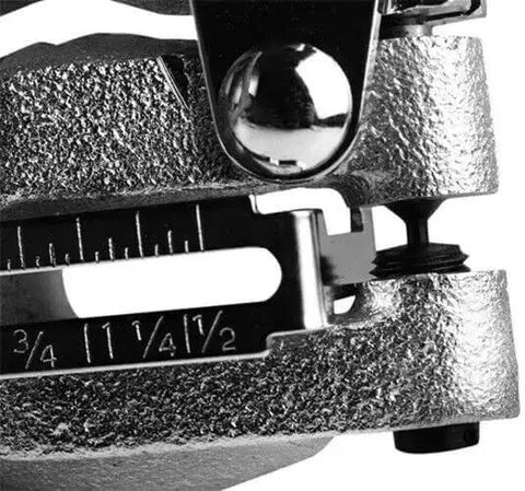 Close-up of Hand Powered Hole Punch Tool Kit for Steel Sheet Metal, showing measurement gauge and punch mechanism.
