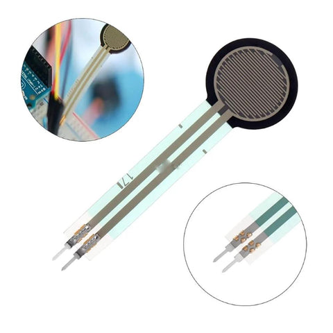FSR402 force sensing resistor on flexible polyimide strip with round black sensing pad and two metal leads