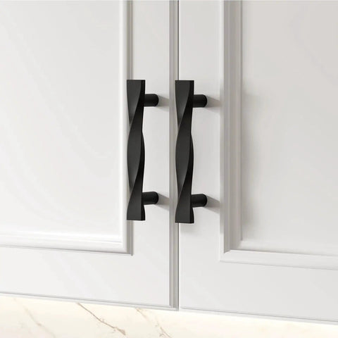 10 Pack Matte Black Cabinet Handles Made From Solid Zinc Alloy With Corrosion Resistant Coating installed on white cabinet doors
