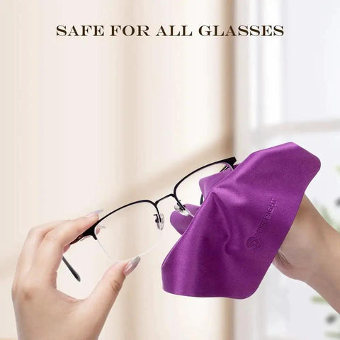 Person cleaning glasses with purple microfiber cloth from Microfiber Cloths For Glasses And Screens Safe For Coated Lenses 6 Pack 5.7x6.7.