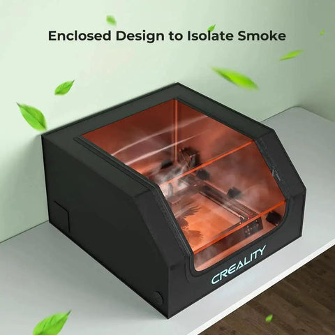 Laser Engraver Enclosure With Fireproof And Dustproof Protective Cover Built In Fan And Pipe For Most Laser Engravers 27.5x28.3x15.7In Reduces Smoke Odor Noise And Provides Eye Protection Creality, shown installed on a table with a clear viewing window.